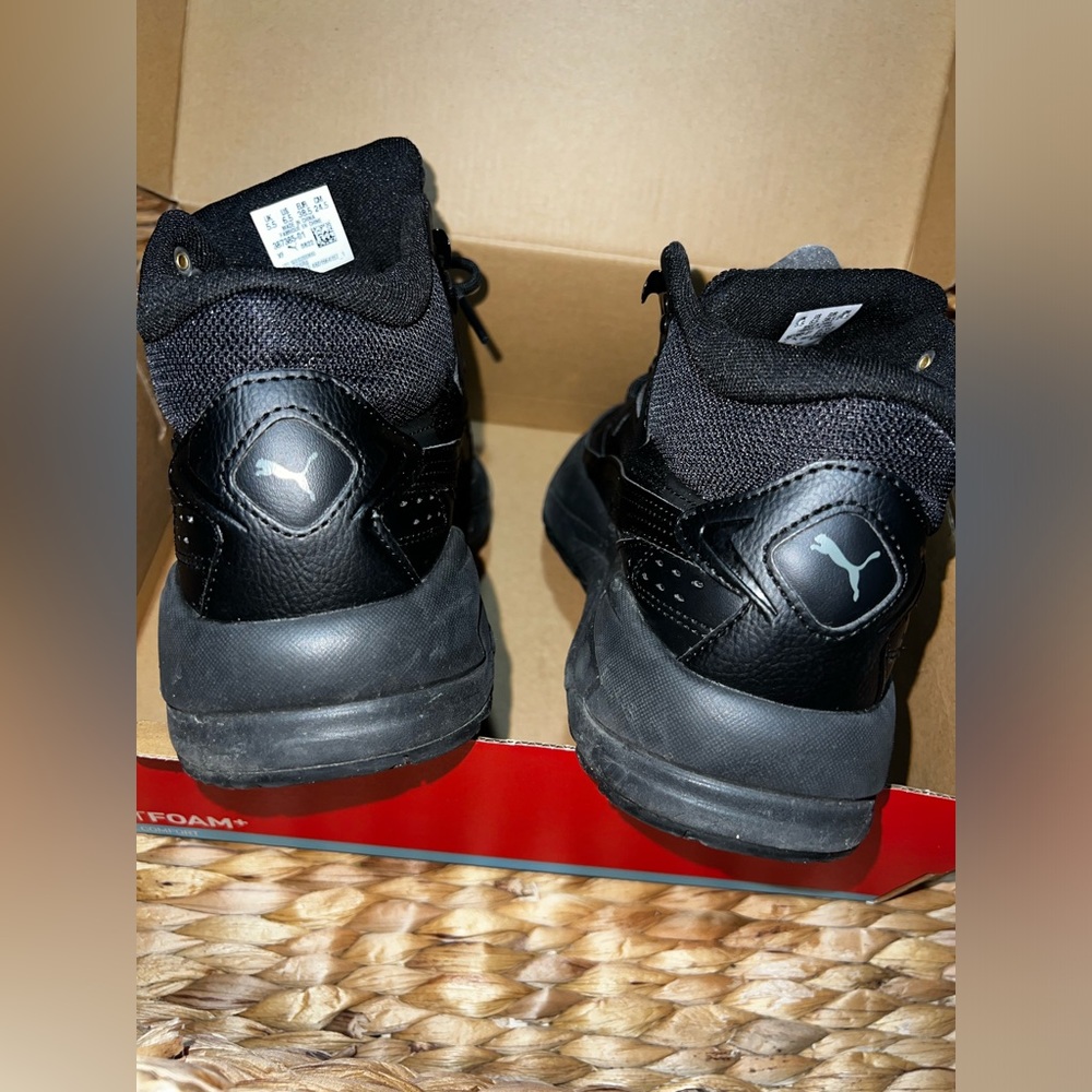 Size 6.5 black puma sneaker boot.